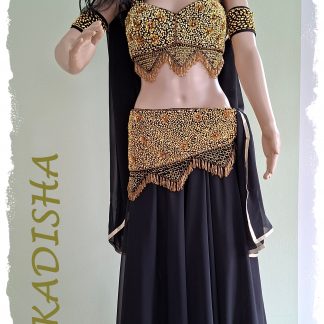 Bauchtanzkostüm in schwarz/gold. Bustier und Schärpe in schwarz dazu weiter schwarzer Chiffonrock, alles mit goldenen Perlen uns Pailletten  bestickt, Größe XS bis M